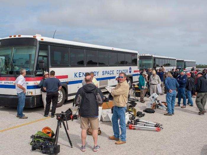 I arrived in time to catch a ride to see Falcon Heavy on its launchpad. A gaggle of other journalists were waiting with all sorts of gear.