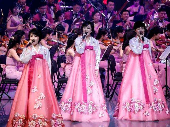 Wearing brightly colored tuxedos and traditional Korean garments, the orchestra catered to a wide-ranging audience, including an older generation of Koreans.