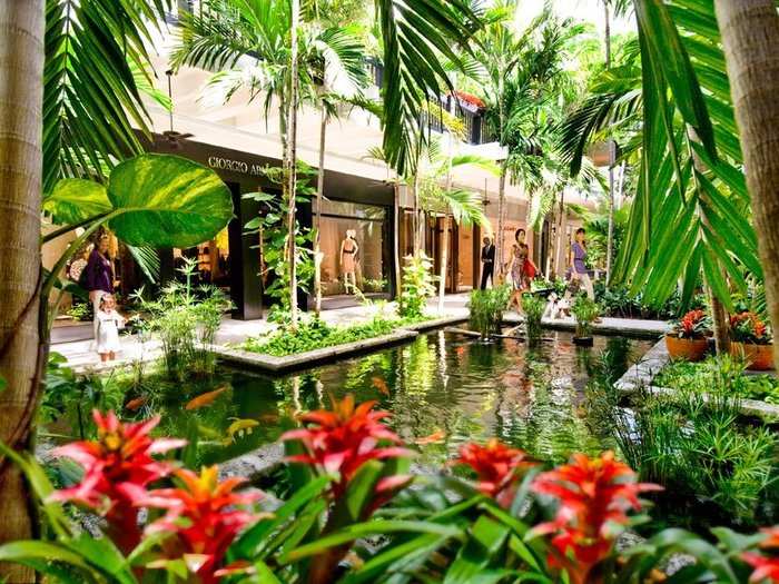 The open-air mall is gorgeous, with palm trees, fountains, and koi ponds throughout.