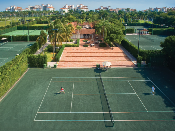 In 2014, Fisher Island Club completed a $60 million revitalization project that included the addition of a new golf course, tennis courts, a spa and salon, restaurants, a beach club and marina, and a hotel.