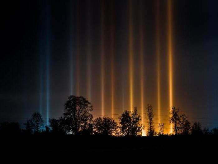 Majoran said the light pillars were bright enough to shoot with a phone. But he used a Nikon D850 on a tripod and optimized the settings for a long exposure to create sharper images.