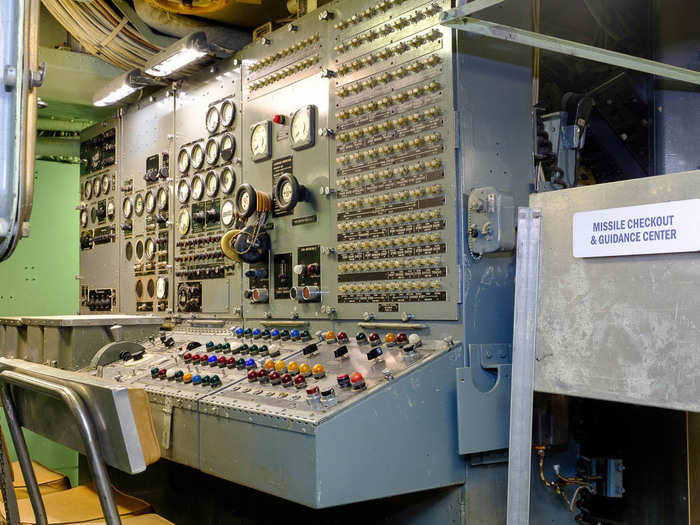 This is the missile checkout and guidance center. The lights and meters indicate the readiness of the Regulus I for firing, as well as controls to start the engine and launch the missile.