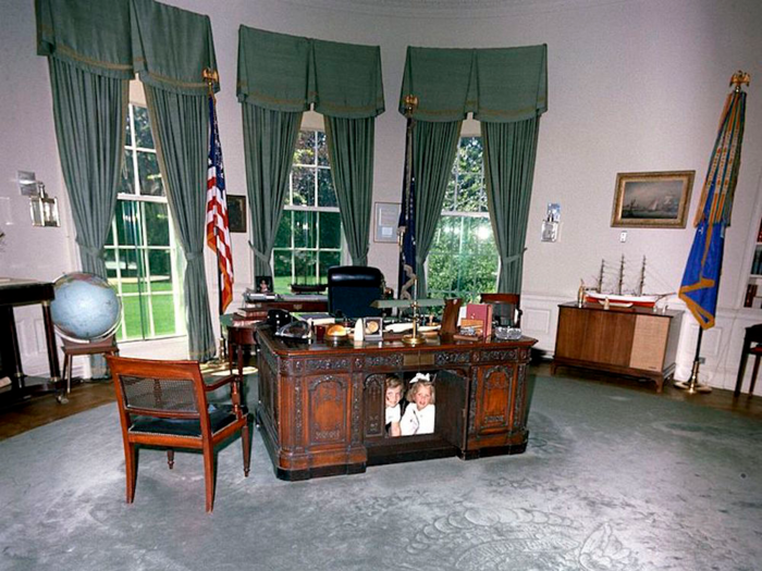 First Lady Jacqueline Kennedy was responsible for introducing the famed Resolute desk to the Oval Office. The piece had been carved from timbers of the British ship H.M.S. Resolute. Queen Victoria had given it to Rutherford B. Hayes as a present.