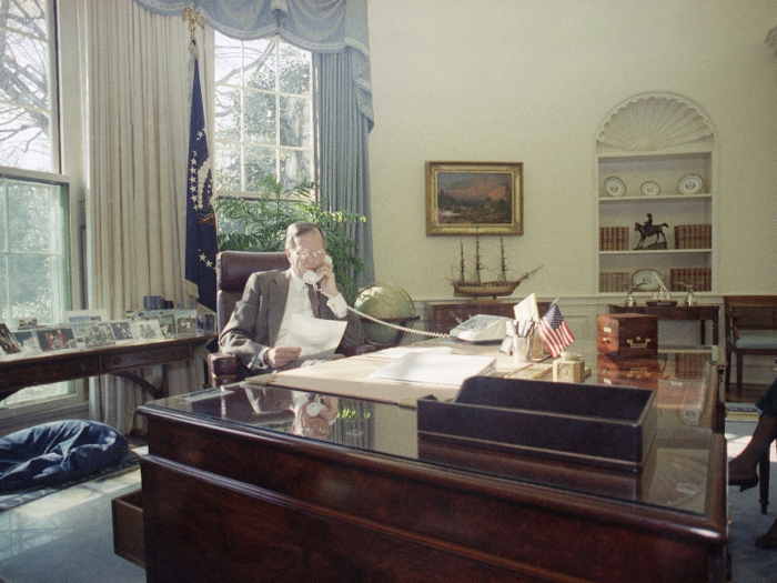 George H.W. Bush went for a pale blue color scheme, in terms of the rug and the drapes. Decorations included paintings of Washington, Rutland Falls, Vermont, the Teton range, and Jackson, ship models, and family photos. He also had a penchant for luminist landscape paintings.