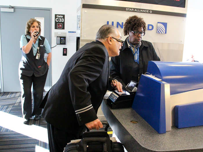 After check in, we head to the gate, and Bingochea scans his United ID to board the plane.