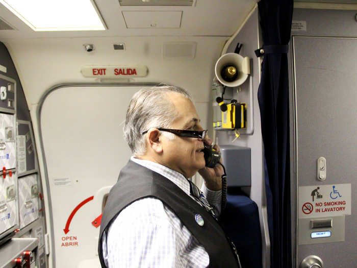 Once the doors close, Bingochea and his fellow flight attendants are finally on the clock. In a series of calls, the head flight attendant lets the rest of the cabin crew and the first officer know that the cabin is ready, the doors are armed, the plane is ready to push back from the gate, and approximately how long the taxi will be.