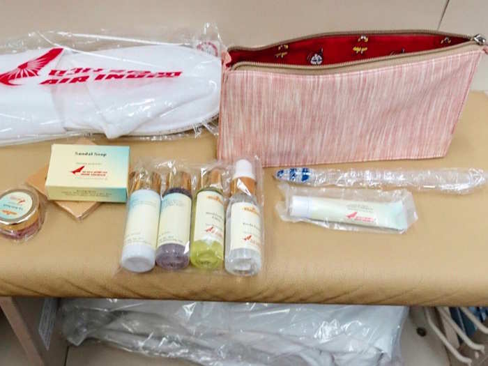 He received an amenity kit which looks pretty well-equipped with in-flight luxuries, including various lotions, shower gels, soap, slippers, a toothbrush, and toothpaste.