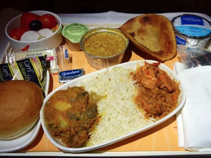 Next up was his Indian supper. He was disappointed not to receive a menu to pick food and drink items from, which these days is relatively commonplace in business class. Honig said the chicken curry was spicy and flavoursome. But while the spread looks pretty varied, he said it wasn