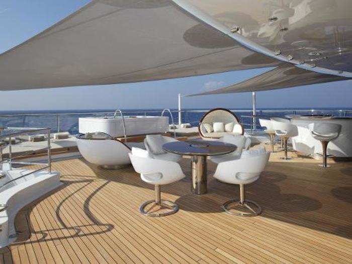 The uppermost deck has its own jacuzzi and an outdoor bar.