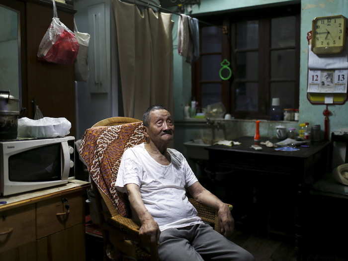 After quitting his job at a stationery store, Wang Cunchun, 93, now shares a 100 square foot Shanghai apartment with his son. He told a Reuters photographer he relies on his pension and a little income from trading stocks as a hobby.