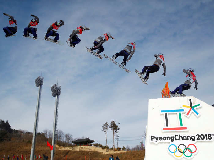 Japanese snowboarder Miyabi Onitsuka begins this jump facing forward, but it is not long before she is completing a 360-degree spin in midair.