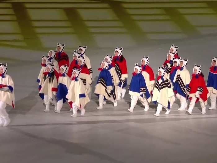 Some local elementary school children came out just before the South Korean national Anthem.