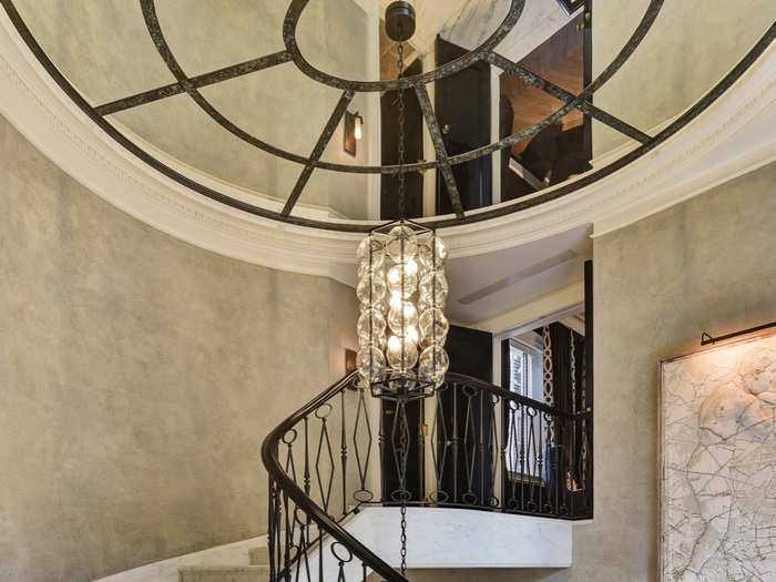 Plank extensively renovated the home. One of the most notable additions is this 22,000-pound marble staircase.