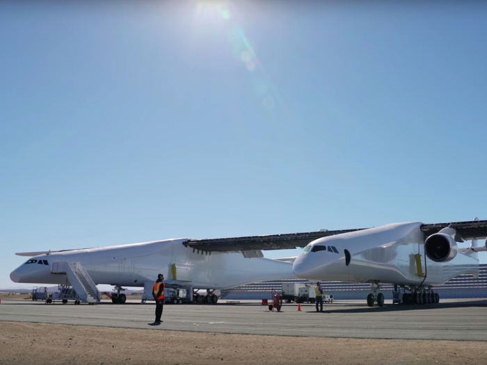 It weighs 500,000 pounds and needs 28 wheels between its two fuselages.