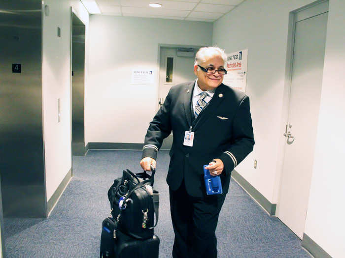 At Denver International Airport, employees have to swipe their United Airlines ID badges to access an elevator that takes us up to the fourth floor.