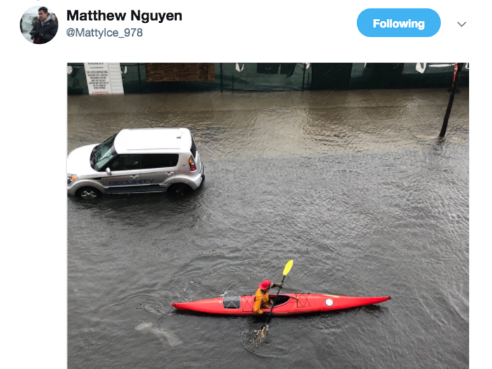 At around 10 a.m., the tide in Boston was already high enough for this kayaker to head out into the flooded streets. The National Weather Service recorded the tide at 14.67 feet high shortly after 11 a.m. Tuesday.