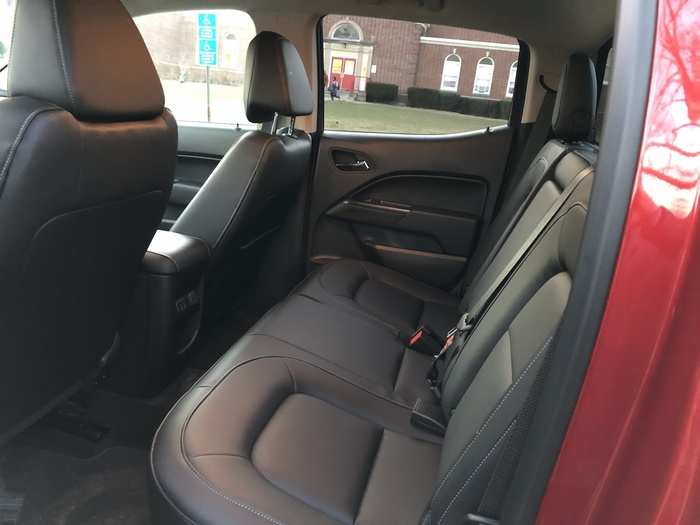 The back seats are a bench layout. The crew-cab setup is relatively roomy, but taller folks could find their knees bumping against the front seats.