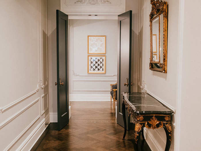 The suite has a rather long hallway that leads to the master bedroom. It creates a nice sense of distance between the living and sleeping spaces.