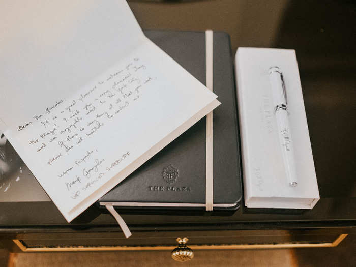 I found a handwritten letter from VIP guest services and a complimentary notebook and pen. It