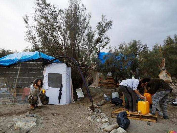 A man named Avraham sits at his makeshift camp — many of these homes or "zulas," which is Hebrew slang for a hangout, dot the Metzoke Dragot beach.