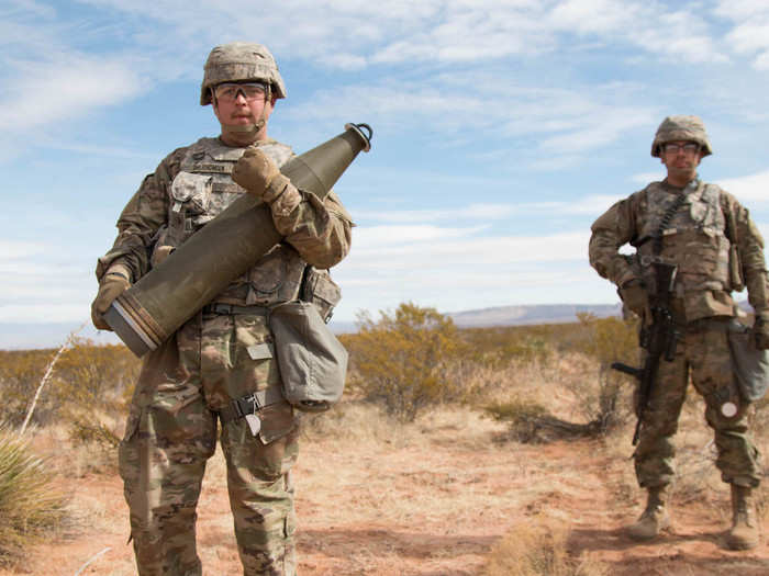 The crew showed me how they carry the 155mm projectiles, which weigh over 100 pounds. Some artillerymen said they carry it over their shoulders too.