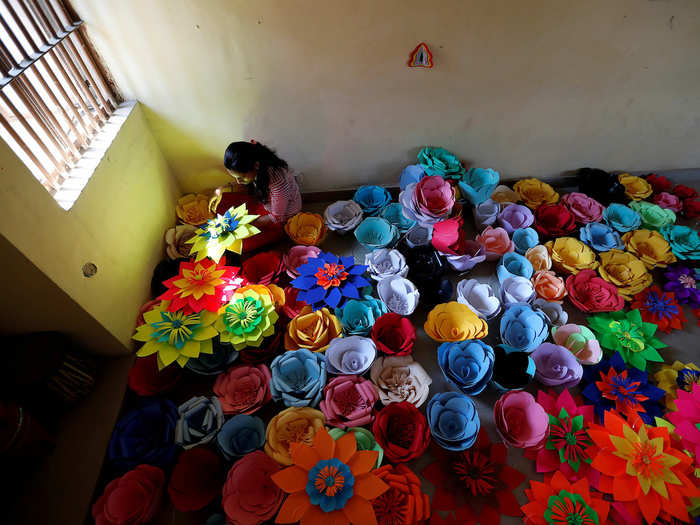 Even some prison inmates at the massive Tihar Jail in New Delhi are colorfully celebrating the day.