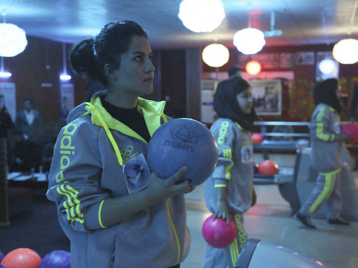 In Afghanistan, this woman celebrated the first female bowling competition at the Strikers bowling alley in Kabul on Monday.