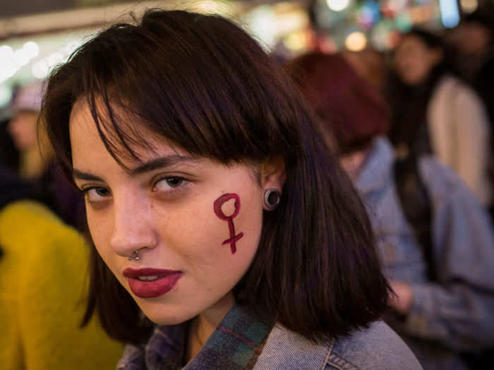 Nearby, this woman was proudly female as she traveled down Istanbul