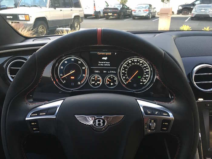 In front of the driver is a set of clear and concise analog gauges shared with other Continental models.