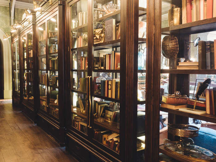 When you step off the elevator, the view of the Bar Room is blocked by this gorgeous bookcase-cum-wall. I could have probably spent an hour looking through the many whimsical knickknacks spread over the shelves.