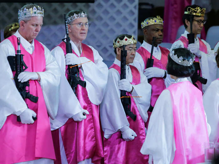 The crowns were meant to represent the sovereignty of royalty. "We pray they would stand as kings and queens with their crown and rod of iron," Rev. Moon said during the ceremony.