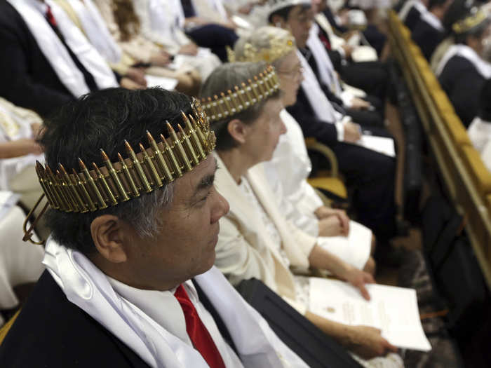 Many of the participants also wore crowns — some made out of ammunition.