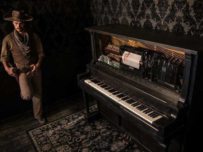 An unmanned piano played a song from the show. The sheet music was splattered with blood, just like in the "Westworld" season two trailer. The hosts didn