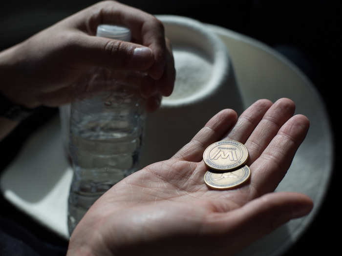 We each received two tokens to buy alcohol from one of the town