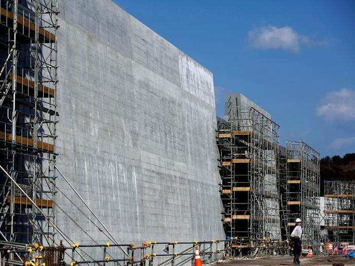 These newer walls replaced the old 13-foot breakwaters, which were destroyed during the Fukushima disaster on March 11, 2011.