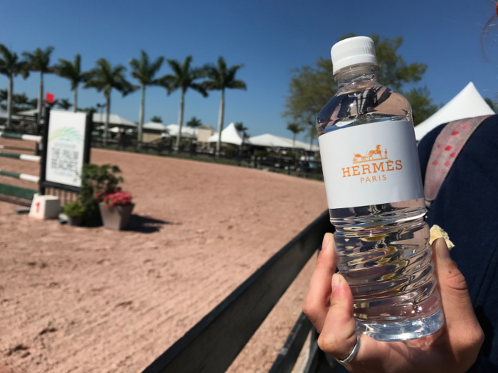 Hermès is a major sponsor, giving away free branded waters and hosting a lounge for competitors.