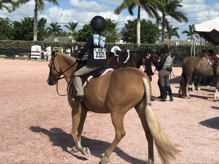 Kids as young as six compete on smaller horses in the two rings dubbed "Pony Island."