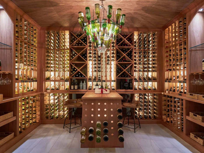 A temperature-controlled wine cellar has its own tasting room and bar seats.