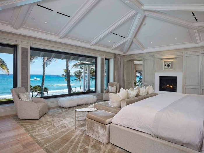 The master suite offers sweeping views of the ocean.