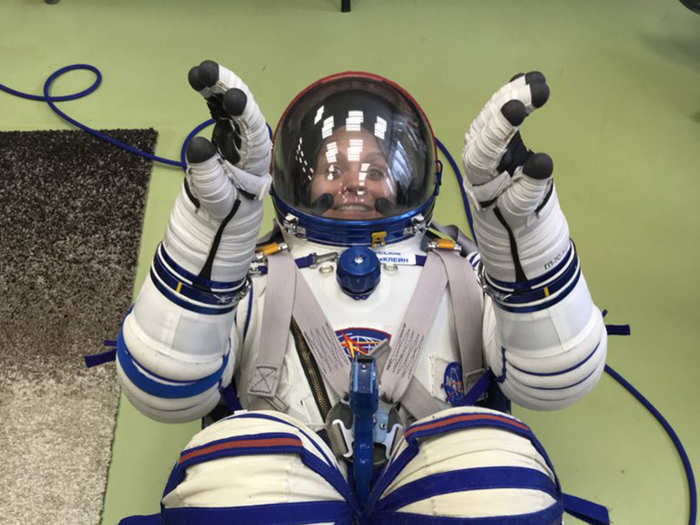 "[Y]ou have to try out said suit for nearly two hours while pressurized to make sure nothing hurts," McClain said on Twitter. "Well, that nothing hurts too badly. Mission accomplished. My first act in my new real spacesuit was to sit and watch a movie! Oh and play with my gloves."