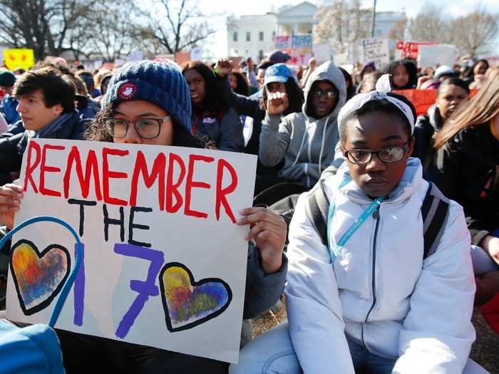 After making their voices heard, students turned their backs to the White House in protest.