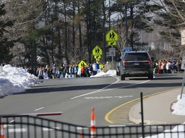 In Sandy Hook, Connecticut, the site of the 2012 Sandy Hook school shooting, students walked out from Newtown High School.