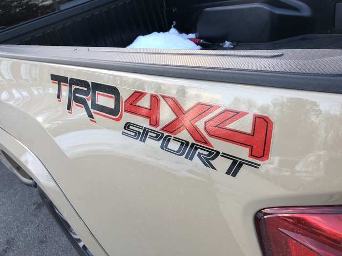 A lot of information on the sticker: "TRD" stands for "Toyota Racing Development," "4x4" is self-explanatory, and "Sport" just doubles down on the excitement.