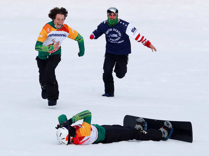 Australian snowboarder Simon Patmore basked in the glory of his gold medal-winning run on Monday and was soon accompanied by teammate Bud Tudhope (left), who wanted to help celebrate his success.