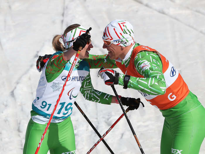 There is great camaraderie between skiers and guides and they celebrate when they cross the finish line together.