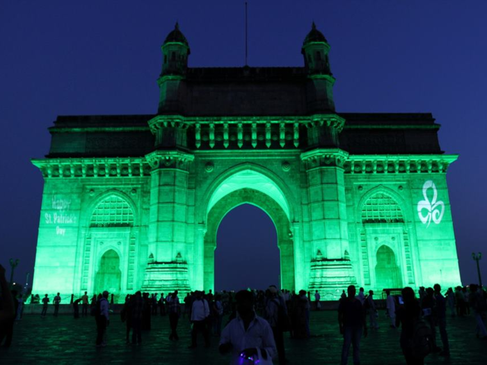 The iconic Gateway of India in Mumbai lights up green on the night of St. Patrick