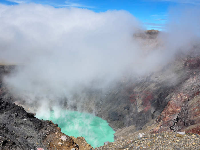 Admire the view of Cerro Verde national park for miles from the top of the Santa Ana volcano in El Salvador.