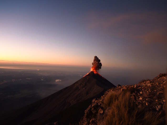 Watch an erupting volcano at Acatenango, Guatemala.