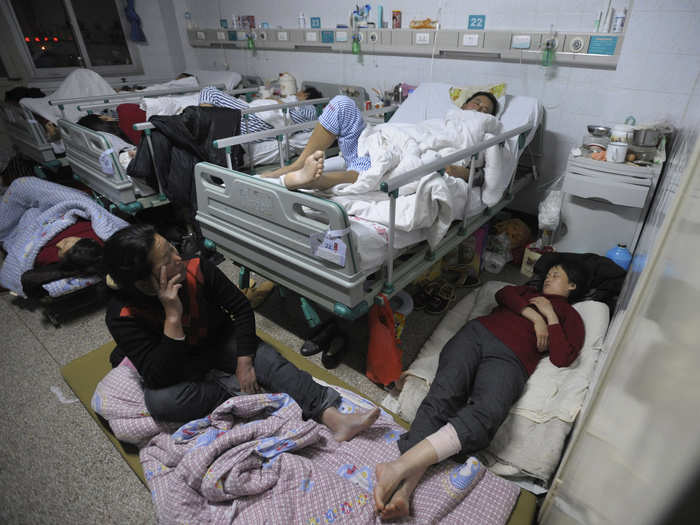 In Hefei, an industrial Chinese city, multiple families pack into one room.