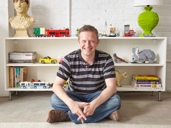 Today, Kenney works in a studio with a huge wall of LEGO bins